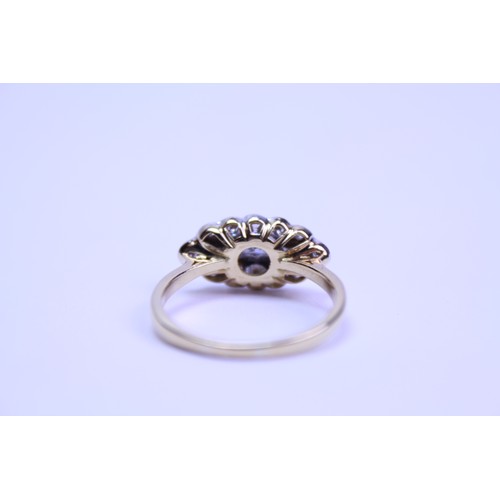 104 - A art deco 18ct gold ring, set with 18 small diamonds.