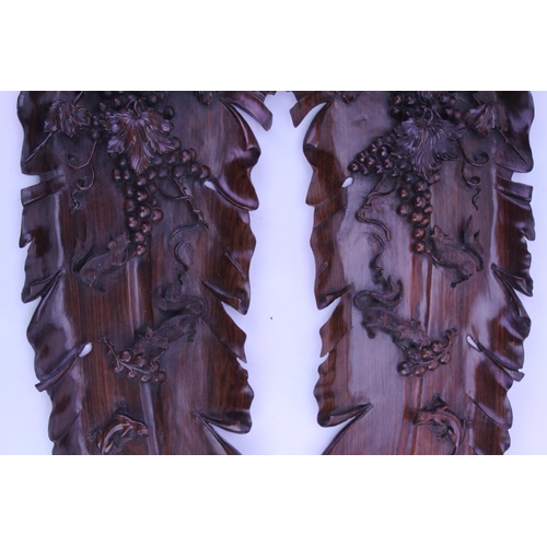 916 - A Rare Pair of Japanese Carved Elm Daikon Radish Shaped Wall Appliques carved with Rats, Lizards & S... 