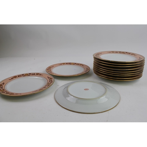 918 - A Collection of 12 Japanese Porcelain Dinner Plates in Pink & Gold.