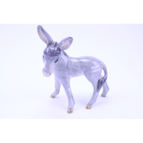 797 - An Unusual Study in Grey of a Wedgwood & Company Donkey.