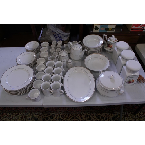 834 - A Large Quantity of White & Gold rimmed Dinner Service to include Large Plates, Bowls, Two Oval Plat... 