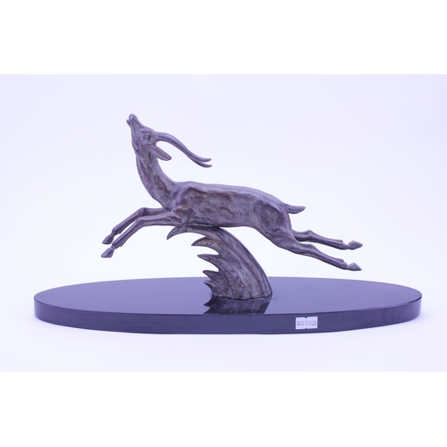 407 - An Art Deco design Running Stag Spelter Ornament on a slate base. Measuring: 40cms long x 21cms high... 