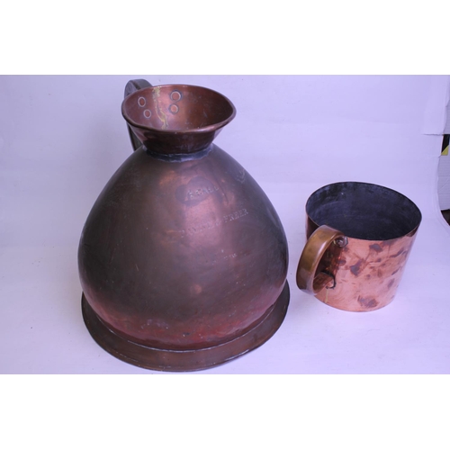 409 - A Late 19th Century Copper 4 Gallon Jug along with a similar Measure.