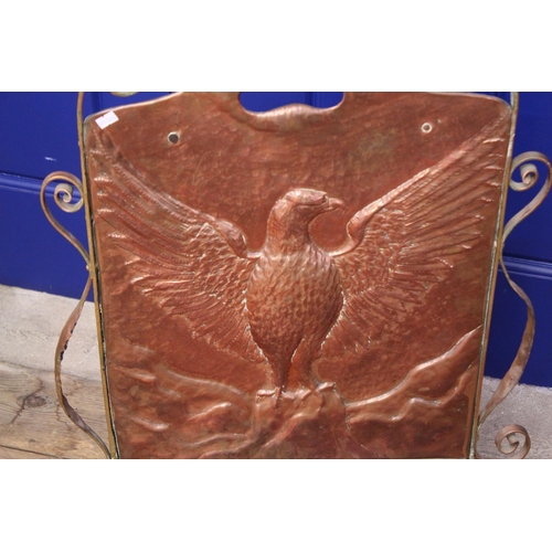 411 - An Arts & Crafts Newlin Hayle Style School Fire Screen embossed with a Winged Golden Eagle.