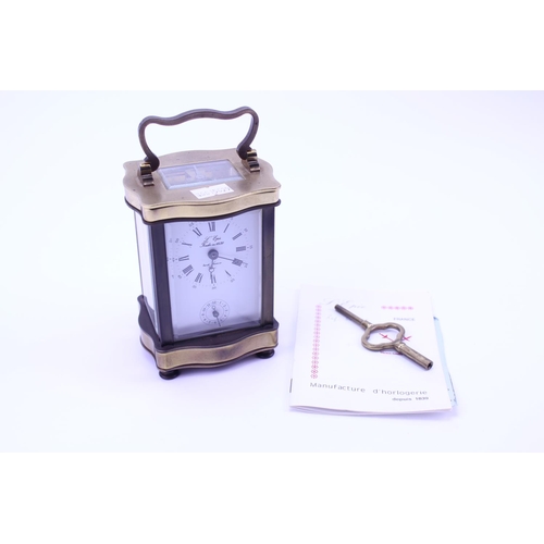 283 - A French Brass Cased Carriage Clock with Alarm by 