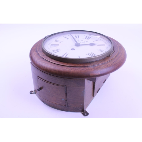 285 - A British Railways B.R.(S) Oak Cased Clock with Brass mechanism, painted dial No: 11236. Measuring: ... 