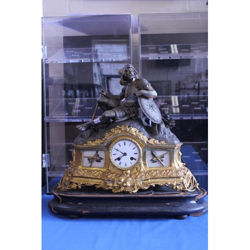 286 - A Late 19th Century Spelter Cased Drawing Room Clock with inset Figure of a Roman Gladiator with ena... 