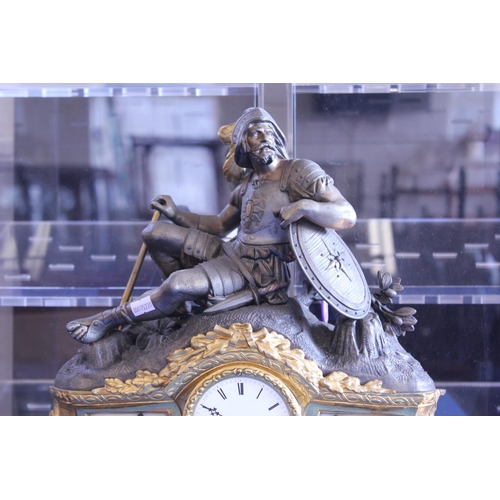 286 - A Late 19th Century Spelter Cased Drawing Room Clock with inset Figure of a Roman Gladiator with ena... 