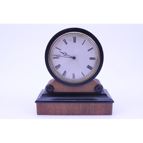 287 - A Victorian Ebony & Mahogany Circular enamel face Drawing Room Clock fitted with a French Movement b... 