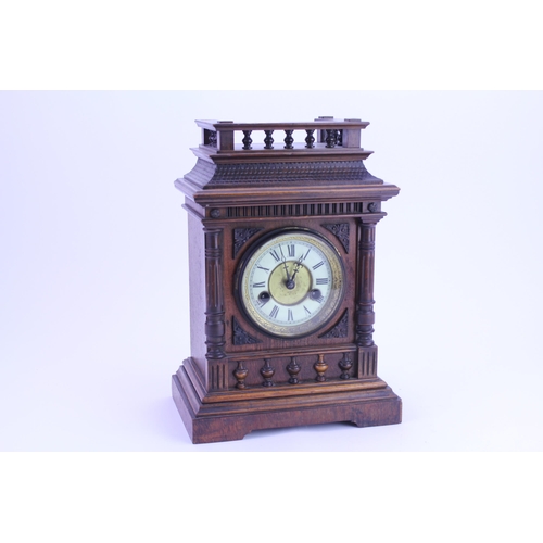 288 - A German Made Bracket Clock in a Black Forest design Case, Chaptering, Black Numerals & Twin Winder.... 