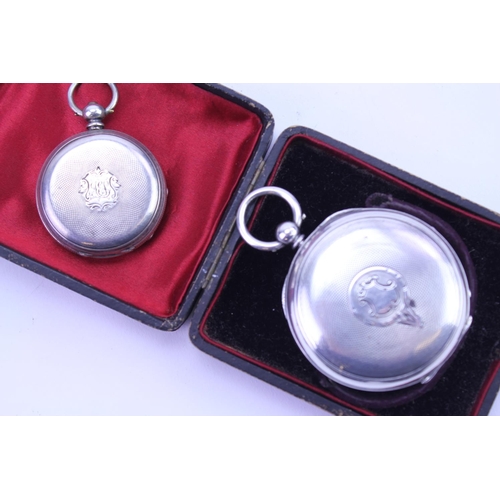 269 - A Silver Cased Pocket Watch with enamelled Face, engine turned back along with one other.