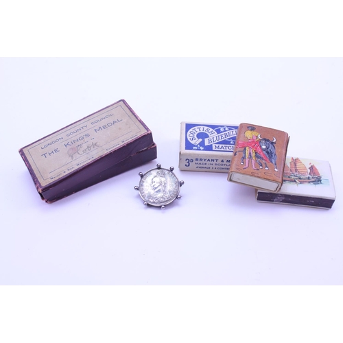 352 - An 1887 Silver Jubilee Head Half Crown mounted as a Brooch along with various Matchboxes.