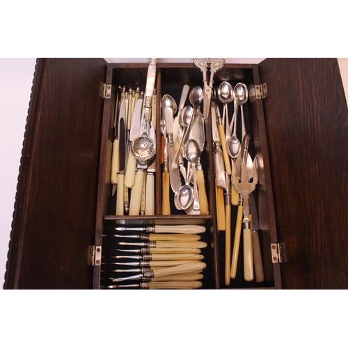 79 - A fold over topped cutlery box containing Victorian and later Silver plated cutlery including a tea ... 