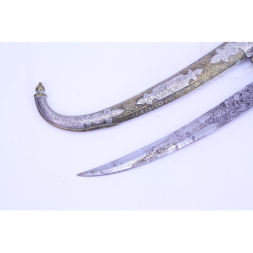 386 - A Khanjar Dagger in a Silver Coloured & Brass Sheath fitted two lugs, Wooden Handle with a Star of D... 