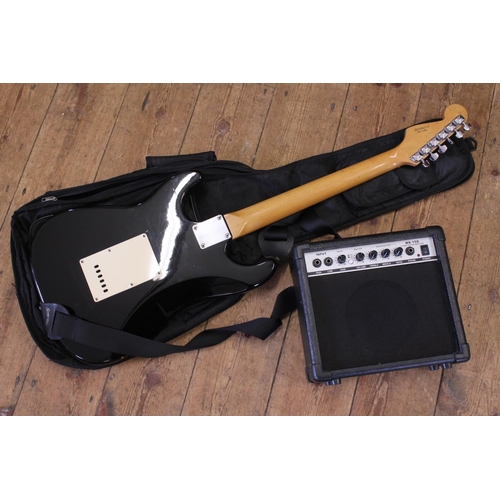 932 - An Electric Guitar made by Squire in black and cream (used condition) along with a MS-15G amp.