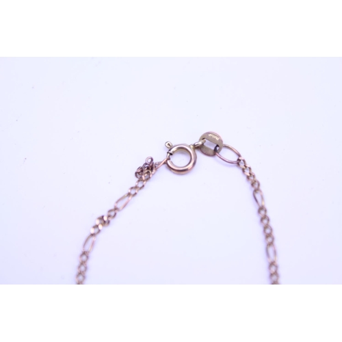 195 - A 9ct Gold chain, hung with a 9ct Gold heart shaped locket. Total weight 7.6g.