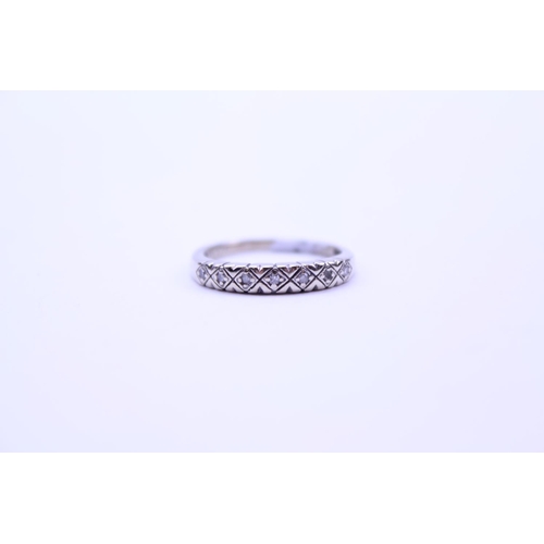 203 - A 9ct, Diamond set cross pattern ring.