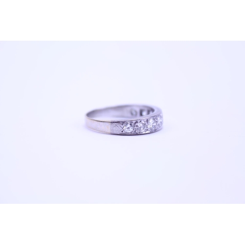 212 - A Ladies 18ct Gold Half Eternity Ring mounted with 9 Diamonds. Weighing: 3.75 grams. Size: p. With A... 