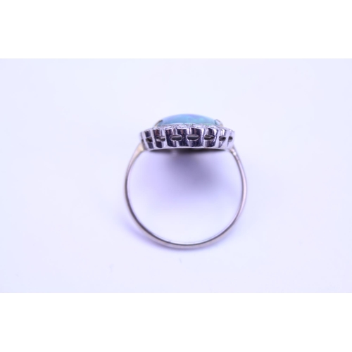 216 - An 18ct Gold Diamond & Black Doublet Ring. Size: o.