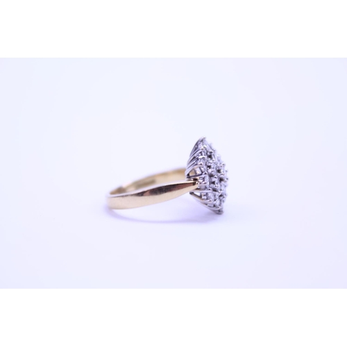 112 - An 18ct Gold Diamond Ring set with numerous Diamonds in a Cluster Setting. Size: j/k.