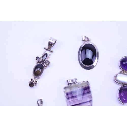 122 - A Collection of Silver Semi Precious Stone Jewellery to include 9 x Pendants, Black Onyx, Topaz, Var... 