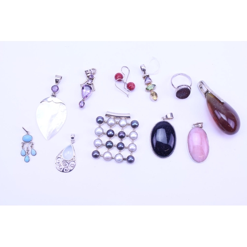 123 - A Collection of Silver Semi Precious Stone Jewellery to include 9 x Pendants, Set of Earrings, Ring,... 