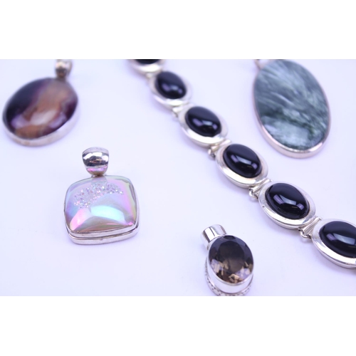 129 - A Collection of Silver Semi Precious Stone Jewellery to include 8 x Pendants, 1 x Ring, Bracelet, On... 