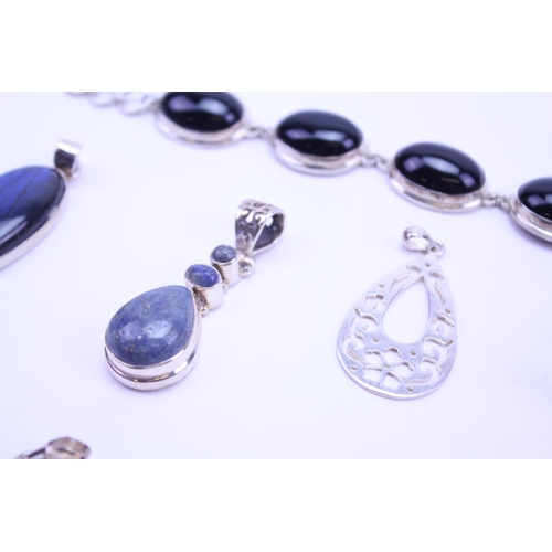 131 - A Collection of Silver Semi Precious Stone Jewellery to include 9 Pendants, 1 x Ring, Bracelet, Onyx... 