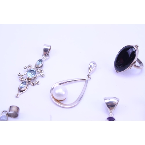 134 - A Collection of Silver Semi Precious Stone Jewellery to include 9 x Pendants, 1 x Ring, Onyx, Geode,... 