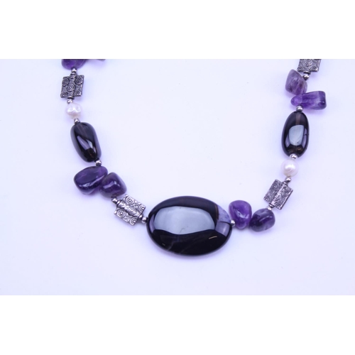 136 - A Modern Purple & Beed Necklace with Silvered Spacers.