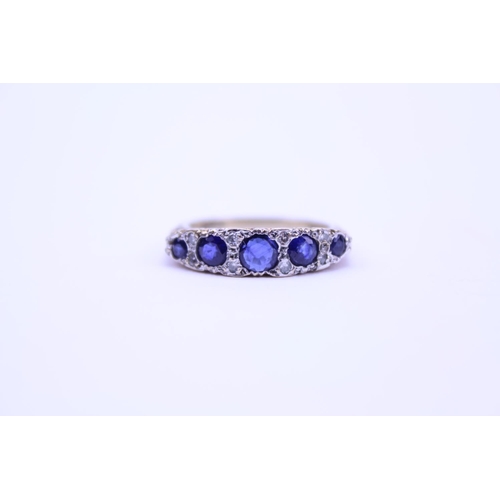 139 - An 18ct Gold Diamond and Sapphire set Ring, set with 5 Sapphires. Size approx O. Total weight approx... 