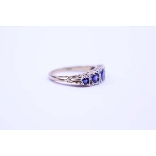 139 - An 18ct Gold Diamond and Sapphire set Ring, set with 5 Sapphires. Size approx O. Total weight approx... 