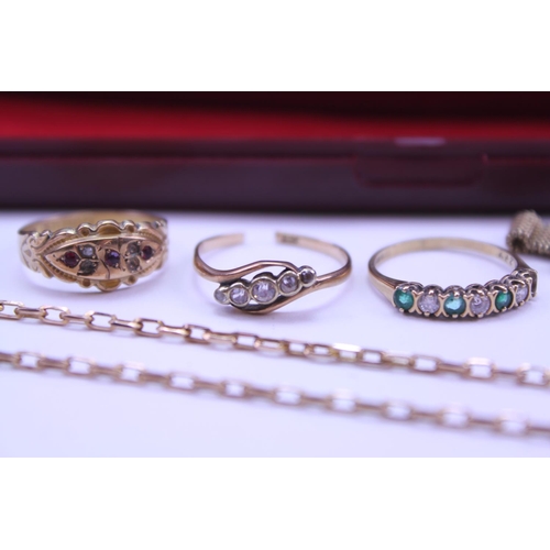 140 - A collection of Gold jewellery to include an Avia wristwatch, 3 rings set with various stones and a ... 