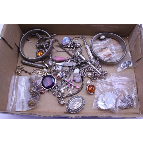 144 - A quantity of Silver jewellery to include necklaces, cameos, pendants, etc.