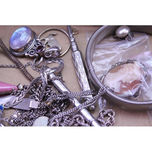 144 - A quantity of Silver jewellery to include necklaces, cameos, pendants, etc.