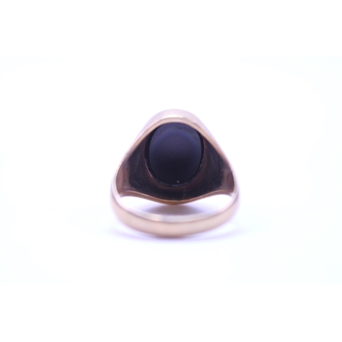 151 - A 9ct Gold Onyx Set Signet Ring. Weight approx 8.4 grams. Size approx V.