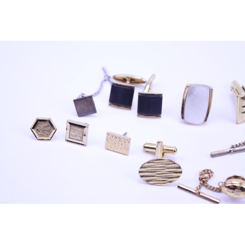 152 - A Collection of tie pins, cufflinks, etc.