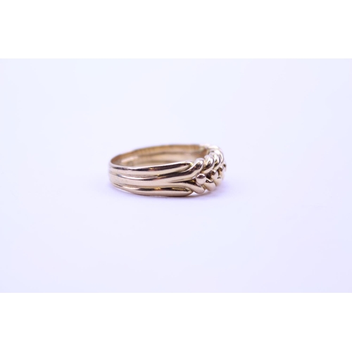 157 - An 18ct Gold Rope design Ring. Total weight: 6.5 grams. Size approx Q.