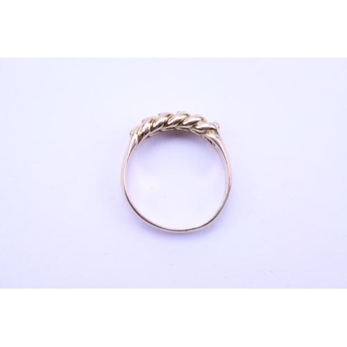 157 - An 18ct Gold Rope design Ring. Total weight: 6.5 grams. Size approx Q.