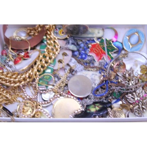 159 - A quantity of costume jewellery to include necklaces, chains, boxes, etc, contained in a jewellery b... 