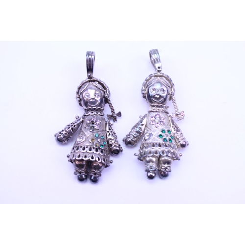 173 - Two Silver dolly charms.