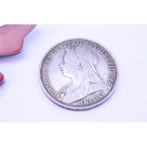 183 - A Silver enamelled butterfly pendant along with a Silver 1897 coin.