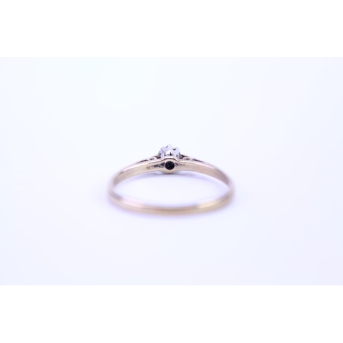 221 - A Ladies 9ct Gold Dress Ring set with an illusion Diamond. Size N.