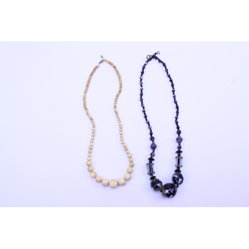 239 - An Czechoslovakian Faceted & Cut Glass Bead Necklace along with one other.