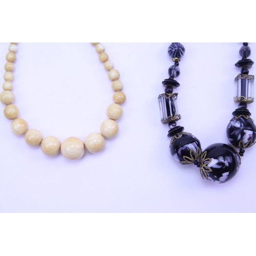 239 - An Czechoslovakian Faceted & Cut Glass Bead Necklace along with one other.