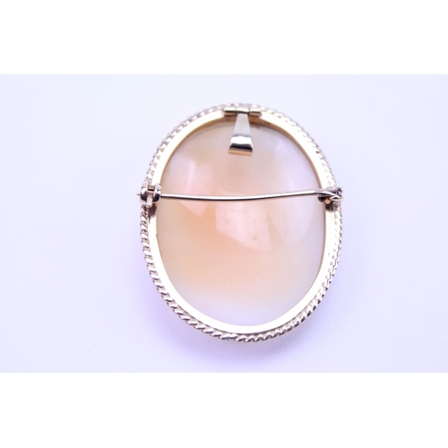 95 - A 9ct Gold Cameo Brooch with pendant attachment, depicting a young lady looking down. Size approx 3.... 