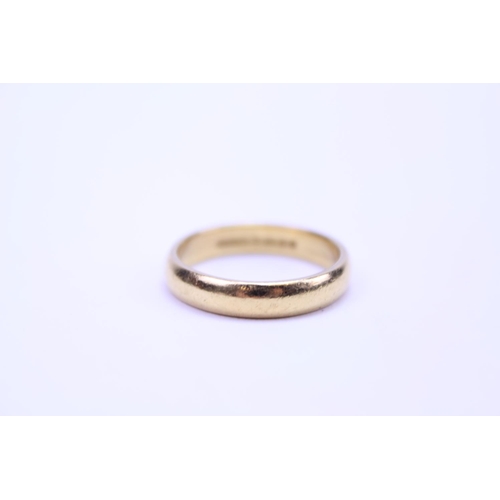 96 - A 22ct Gold wedding band. Total weight approx 7.1 grams. Size T.