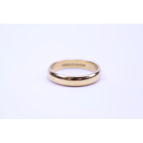 96 - A 22ct Gold wedding band. Total weight approx 7.1 grams. Size T.