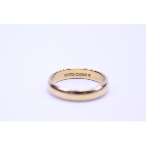 96 - A 22ct Gold wedding band. Total weight approx 7.1 grams. Size T.