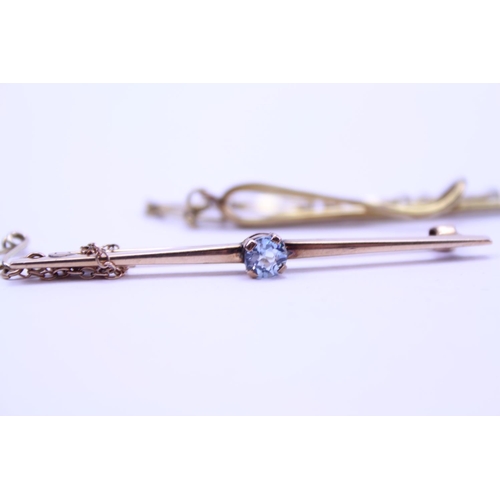 104 - A 9ct Gold paper clip along with a 9ct Gold brooch set with blue stone. Total weight approx 6.5g.